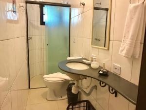 Um banheiro em Hotel Pousada Katmandu