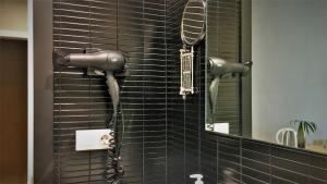 Kúpeľňa v ubytovaní MD Modern Hotel - Jardines