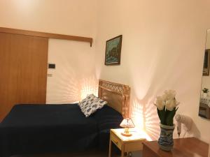 Postel nebo postele na pokoji v ubytování Clorinda - Immobilevante