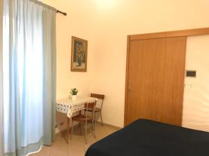 Postel nebo postele na pokoji v ubytování Clorinda - Immobilevante