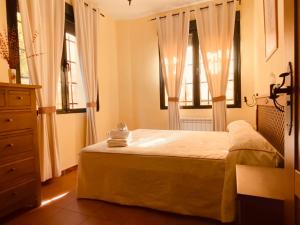 Postel nebo postele na pokoji v ubytování Casa rural las Eras + 28 fotografií