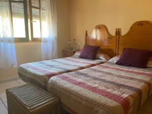 A bed or beds in a room at Ca Ramonet