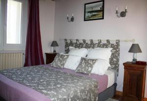 Cama ou camas em um quarto em Relais de La Ganache