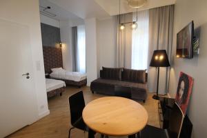 Posteľ alebo postele v izbe v ubytovaní Apartamenty Nowa Kamienica Częstochowa Centrum Szymanowskiego 22A