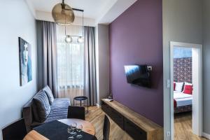 Posteľ alebo postele v izbe v ubytovaní Apartamenty Nowa Kamienica Częstochowa Centrum Szymanowskiego 22A