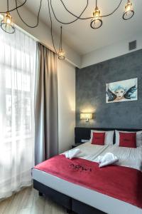 Posteľ alebo postele v izbe v ubytovaní Apartamenty Nowa Kamienica Częstochowa Centrum Szymanowskiego 22A