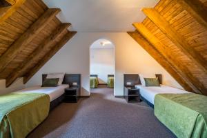 Кровать или кровати в номере Hotel Inn Salland +69 фотографий