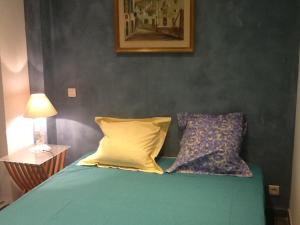 Llit o llits en una habitació de Villa L’Attalaya