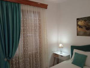 Postel nebo postele na pokoji v ubytování Annas apartment 2 (AgiosNikolaos)