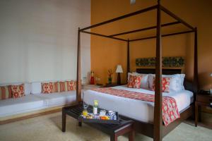 Ένα ή περισσότερα κρεβάτια σε δωμάτιο στο Hotel Quadrifolio