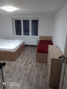 Postel nebo postele na pokoji v ubytování Apartmán u Davida