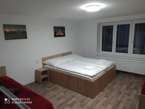 Postel nebo postele na pokoji v ubytování Apartmán u Davida