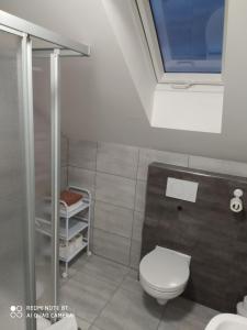 Koupelna v ubytování Apartmán u Davida
