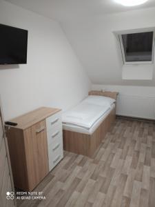Postel nebo postele na pokoji v ubytování Apartmán u Davida