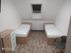 Postel nebo postele na pokoji v ubytování Apartmán u Davida
