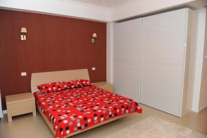 
Un pat sau paturi într-o cameră la Apartament Tanya Tudor's Residence
