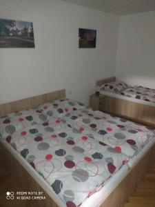 Postel nebo postele na pokoji v ubytování Apartmán u Davida