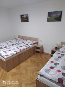 Postel nebo postele na pokoji v ubytování Apartmán u Davida