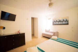 Postel nebo postele na pokoji v ubytování Asilé Hotel Boutique