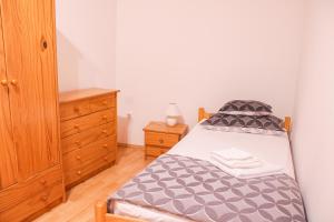 Кровать или кровати в номере Antini Trudi