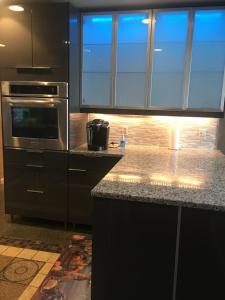 a kitchen with a stove and a counter top at Home Sweet Home in Solon