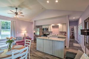 a kitchen and living room with a table and a couch at Saylorsburg Retreat 16 Mi to Ski Resort in Saylorsburg +24 photos