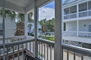 a view from the balcony of a house at Surfside Beach Home Base Steps to Pool and Ocean! in Myrtle Beach