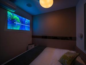 Postel nebo postele na pokoji v ubytování Super Hotel Tokyo Hamamatsucho + 37 fotografií