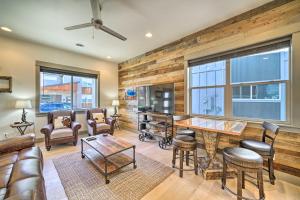 a living room with a table and chairs at Bozeman Stand-Alone Home with River Access! in Bozeman