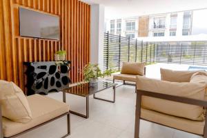 Posezení v ubytování Moderno y acogedor condominio en zona exclusiva