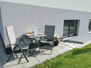 Patio alebo iná vonkajšia časť ubytovania Appartement Falkner Manuel