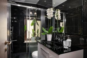 A bathroom at Castello Luxury Residence with Private Jacuzzi