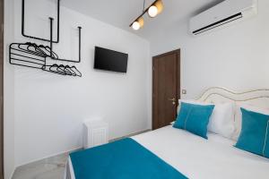 A bed or beds in a room at Castello Luxury Residence with Private Jacuzzi