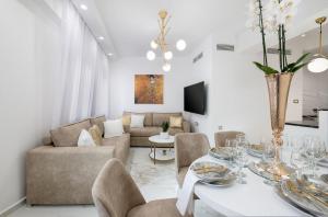 A seating area at Castello Luxury Residence with Private Jacuzzi