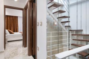 A bed or beds in a room at Castello Luxury Residence with Private Jacuzzi
