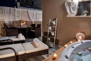 A seating area at Castello Luxury Residence with Private Jacuzzi