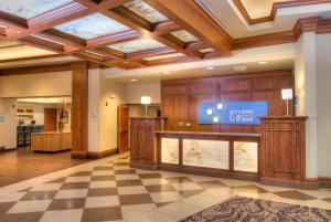 a lobby with a flat screen tv in a building at Holiday Inn Express Spokane-Downtown, an IHG Hotel in Spokane