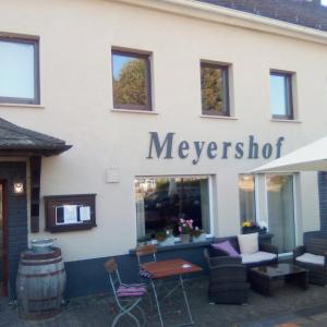 a mexican restaurant with a sign on the side of a building at Ferienappartement Studio " Michel" Otzenhausen in Nonnweiler