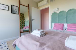 Posteľ alebo postele v izbe v ubytovaní Apartamenty Your Seaside