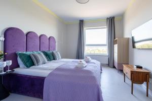 Posteľ alebo postele v izbe v ubytovaní Apartamenty Your Seaside