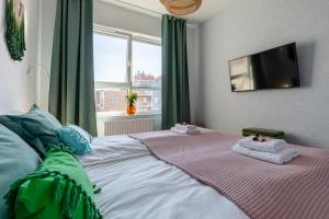 Posteľ alebo postele v izbe v ubytovaní Apartamenty Your Seaside