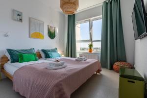 Posteľ alebo postele v izbe v ubytovaní Apartamenty Your Seaside