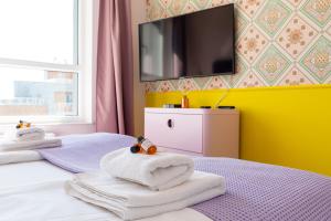 Posteľ alebo postele v izbe v ubytovaní Apartamenty Your Seaside