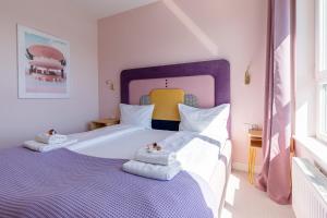 Posteľ alebo postele v izbe v ubytovaní Apartamenty Your Seaside