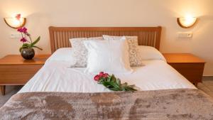 Posteľ alebo postele v izbe v ubytovaní Hostal Montserrat