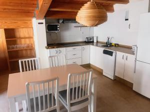 Kuchyň nebo kuchyňský kout v ubytování Apartamentos Casa Les Valeres