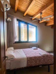 Postel nebo postele na pokoji v ubytování Apartamentos Casa Les Valeres