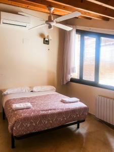 Cama o camas de una habitación en Apartamentos Casa Les Valeres