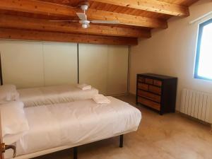 Postel nebo postele na pokoji v ubytování Apartamentos Casa Les Valeres
