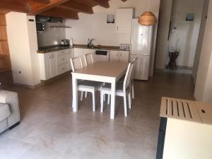 Kuchyň nebo kuchyňský kout v ubytování Apartamentos Casa Les Valeres